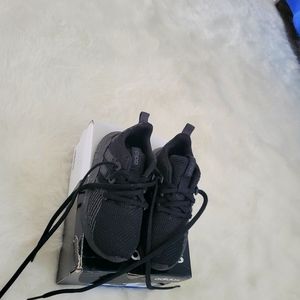 Adidas Questar flow K boys running Shoes  size 11k in the color Black/Grey